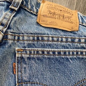 Vintage orange 🧡 tag Levi’s 912 13L mom jeans